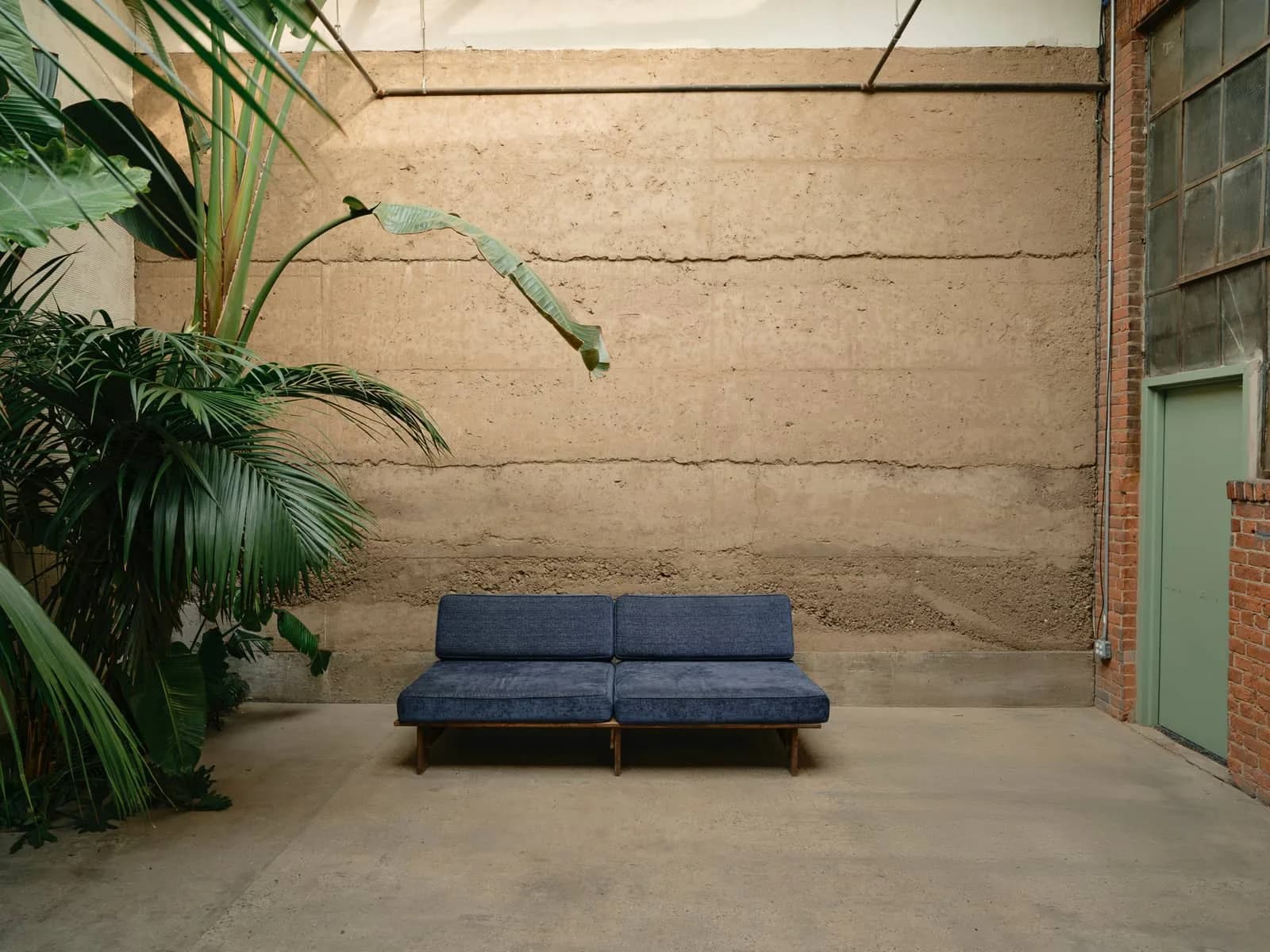 Daylight Studio rammed earth wall